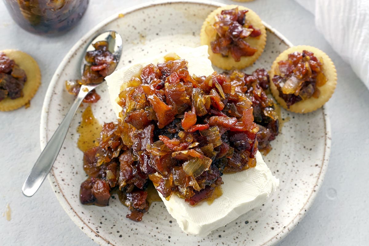 Bacon Onion Jam on a plate with crackers.