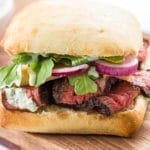 Tri Tip Sandwich on a cutting board.