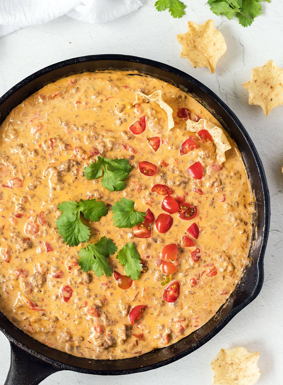 White Queso topped with pico de Gallo.