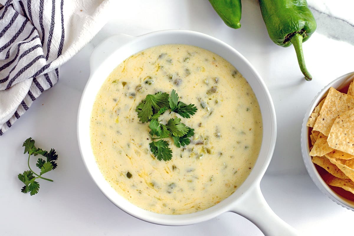 White Queso topped with pico de Gallo.