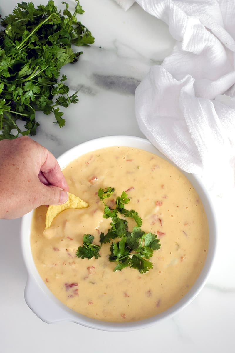 White Queso topped with pico de Gallo.